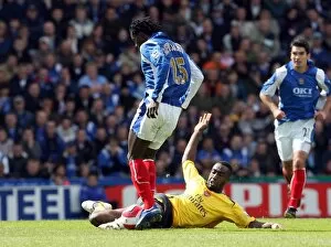 Images Dated 15th May 2007: Johan Djourou (Arsenal) Benjani (Portsmouth)