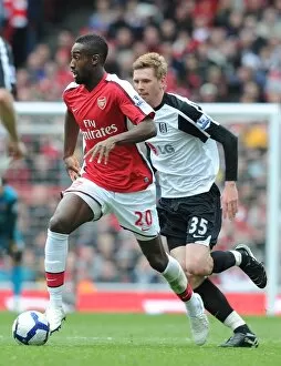 Arsenal v Fulham 2009-10 Collection: Johan Djourou (Arsenal) David Elm (Fulham). Arsenal 4: 0 Fulham, Barclays Premier League