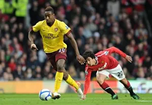 Images Dated 12th March 2011: Johan Djourou (Arsenal) Fabio da Silva (Man Utd). Manchester United 2: 0 Arsenal