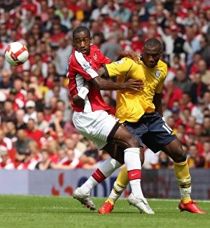 Images Dated 16th August 2008: Johan Djourou (Arsenal) Ishmael Miller (West Brom)