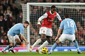 Arsenal V Manchester City 2010-11 Prints: Johan Djourou (Arsenal) James Milner and Gareth Barry (Man City). Arsenal 0