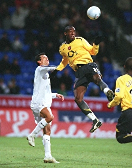 Bolton v Arsenal - FA Cup 2005-06 Collection: Johan Djourou (Arsenal) Jared Borgetti (Bolton). Bolton Wanderers 1: 0 Arsenal