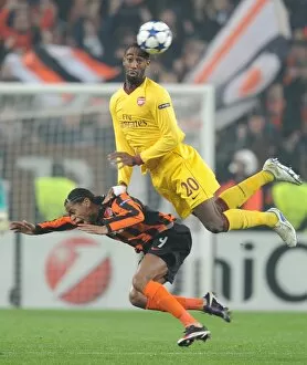 Images Dated 3rd November 2010: Johan Djourou (Arsenal) Luiz Adriano (Shakhtar). Shakhtar Donetsk 2: 1 Arsenal