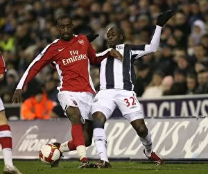 Images Dated 3rd March 2009: Johan Djourou (Arsenal) Marc Antoine Fortune (West Brom)
