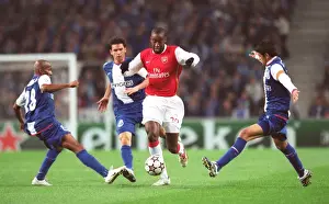 Johan Djourou (Arsenal) Paulo Assuncao and Lucho Gonzalez (Porto)