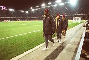FC Thun V Arsenal Prints: Johan Djourou, Arturo Lupoli and Cesc Fabregas (Arsenal) make their way to the substitutes bench aft