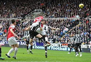 Johan Djourou heads past Newcastle goalkeeper Steve Harper to score the 2nd Arsenal goal