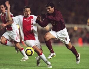Arsenal v Ajax 2005-6 Collection: Jose Reyes (Arsenal) Johnny Heitinga (Ajax). Arsenal 0: 0 Ajax