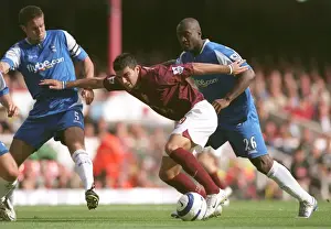 Jose Reyes (Arsenal) under pressure from Matthew Upson and Olivier Tibily (Birmingham)