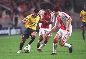 Ajax v Arsenal - Champions League 2005-6 Collection: Jose Reyes (Arsenal) Urby Emanuelson Thomas Vermaelen (Ajax)