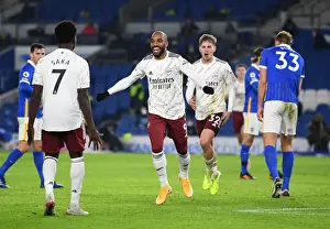 Brighton And Hove Albion V Arsenal 2020-21 Prints: Jubilant Moment: Lacazette and Saka Celebrate Arsenal's Goal Against Brighton & Hove Albion