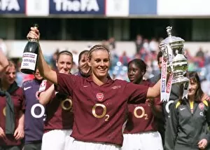 Images Dated 2nd May 2006: Julie Fleeting lifts the FA Cup Trophy for the Arsenal Ladies