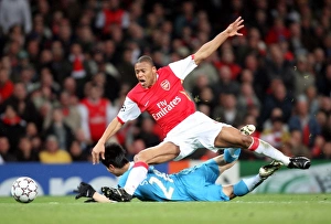 Images Dated 7th March 2007: Julio Baptista (Arsenal) Sun Xiang (PSV)