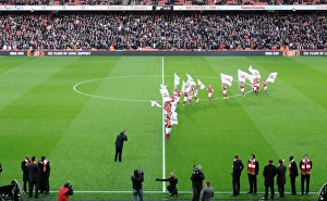 Junior Gunner on the pitch before the match. Arsenal 1: 0 Everton. Barclays Premier League