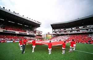 Images Dated 11th May 2006: Junior Gunners with giant crests on the pitch. Arsenal 4: 2 Wigan Athletic
