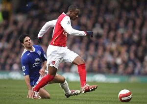 Images Dated 19th March 2007: Justin Hoyte (Arsenal) Mikel Arteta (Everton)