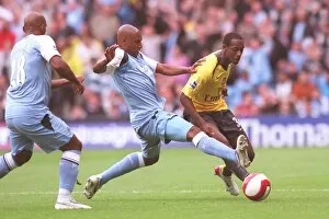 Manchester City v Arsenal 2006-7 Collection: Justin Hoyte (Arsenal) Ousmane Dabo (Man City)
