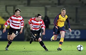 Kelly Smith (Arsenal) Rachel Williams and Vikki Stevens (Doncaster)