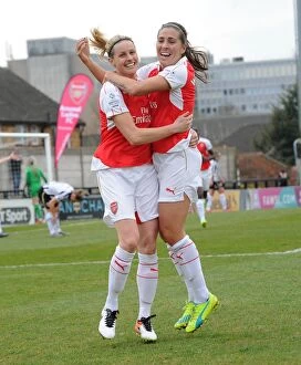 Kelly Smith celebrates scoring Arsenal Ladies 1st goal with Fara Williams