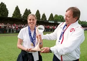 Arsenal Ladies v Umea IK 2006-07 Collection: Kelly Smith and Vic Akers the Arsenal Manager with the European Trophy