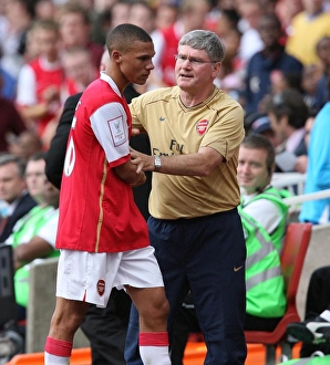 Kieran Gibbs (Arsenal) and Assistant Manager Pat Rice Kieran Gibbs (Arsenal) and Assistant Manager Pat Rice