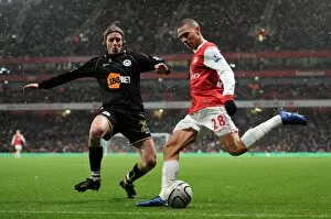 Images Dated 30th November 2010: Kieran Gibbs (Arsenal) Ronnie Stam (Wigan). Arsenal 2: 0 Wigan Athletic