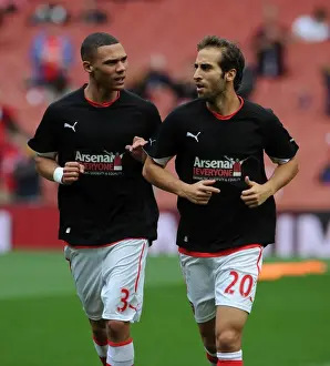 Kieran Gibbs and Mathieu Flamini (Arsenal) in their Arsenal for Everyone T Shirt