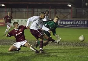 Images Dated 1st February 2008: Kieran Gibbs scores Arsenals 3rd goal past Daniel MacDonald (Burnley)