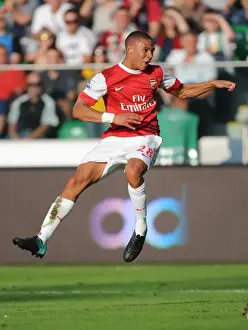 Legia Warsaw V Arsenal 2010-11 Prints: Kieran Gibbs shoots past Liega goalkeeper Kostyantyn Makhnovskyy to score the 4th Arsenal goal