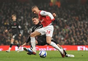 Arsenal v Leyton Orient FA Cup Replay 2010-11 Collection: Kieran Gibbs is tripped for the Arsenla penalty buy Orients Alex Revell