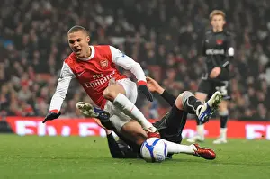 Kieran Gibbs is tripped for the Arsenla penalty buy Orients Alex Revell