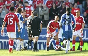 Wigan Athletic v Arsenal 2008-09 Collection: Kieran Gibbs Yellow Carded in Arsenal's 4-1 Victory over Wigan
