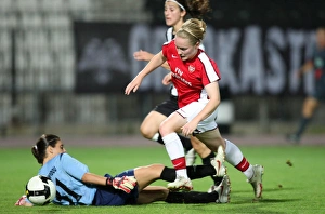 POAK Thessaloniki v Arsenal Ladies 2009-10 Collection: Kim Little (Arsenal) Eleni Charalampidou (POAK)
