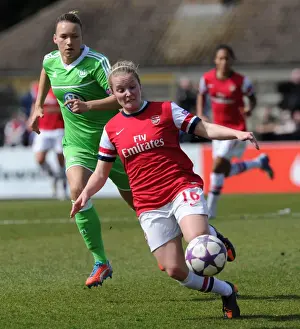 Kim Little Outruns Josephine Henning: Arsenal Ladies vs. VfL Wolfsburg in UEFA Women's Champions League Semi-Final
