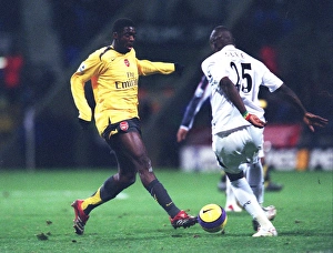 Images Dated 27th November 2006: Kolo Toure (Arsenal) Abdoulaye Faye (Bolton)