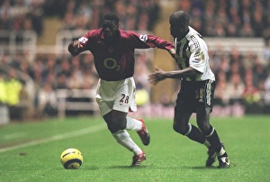 Newcastle United v Arsenal 2005-6 Gallery: Kolo Toure (Arsenal) Amdy Faye (Newcastle United)