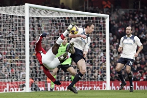 Arsenal v Bolton Wanderers 2008-09 Collection: Kolo Toure (Arsenal) Andrew O Brien (Bolton)