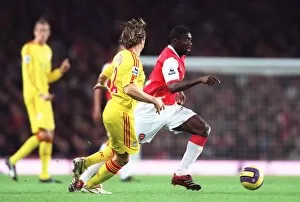 Arsenal v Liverpool 2006-07 Collection: Kolo Toure (Arsenal) Bolo Zenden (Liverpool)