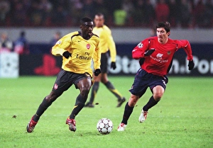 CSKA Moscow V Arsenal Prints: Kolo Toure (Arsenal) Evgeni Aldonin (CSKA)