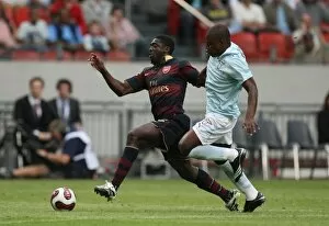 Kolo Toure (Arsenal) Gaby Mudingayi (Lazio)