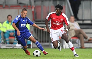Toure Kolo Gallery: Kolo Toure (Arsenal) Ismail Assati (Ajax)