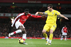Images Dated 16th February 2009: Kolo Toure (Arsenal) Joe Ledley (Cardiff)