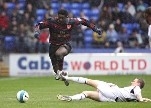 Images Dated 31st March 2008: Kolo Toure (Arsenal) Matt Taylor (Bolton)
