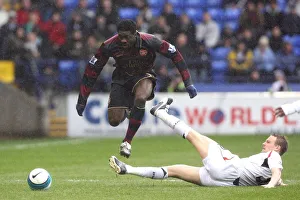 Images Dated 31st March 2008: Kolo Toure (Arsenal) Matt Taylor (Bolton)