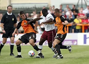 Kolo Toure (Arsenal) Michael Leary and Liam Hatch (Barnet)