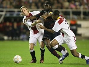 Kolo Toure (Arsenal) Seydou Keita & Christian Poulsen(Seville)