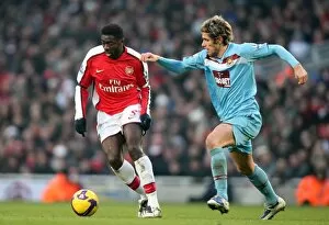 Images Dated 31st January 2009: Kolo Toure (Arsenal) Valon Behrami (West Ham)