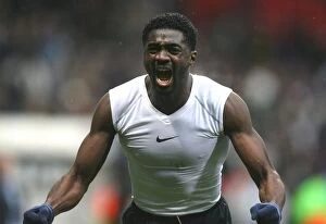 Bolton Wanderers v Arsenal 2007-8 Gallery: Kolo Toure celebrates the Arsenal victory after the match
