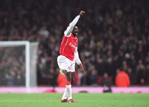 Kolo Toure celebrates Arsenals 3rd goal scored by Tomas Rosicky