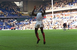 Kolo Toure celebrates by performing a back flip across the pitch Kolo Toure celebrates by performing a back flip across the pitch